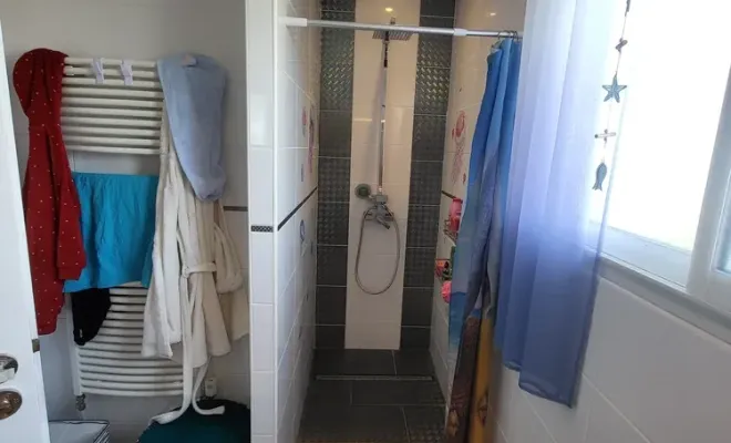Remplacement d'une douche à l'italienne par une baignoire à Vichy, Clermont-Ferrand, DOME HABITAT RÉNOV